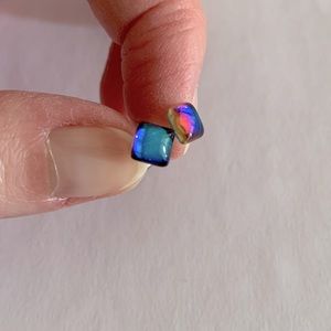 Sterling silver earring stud with iridescent moon stone colored design